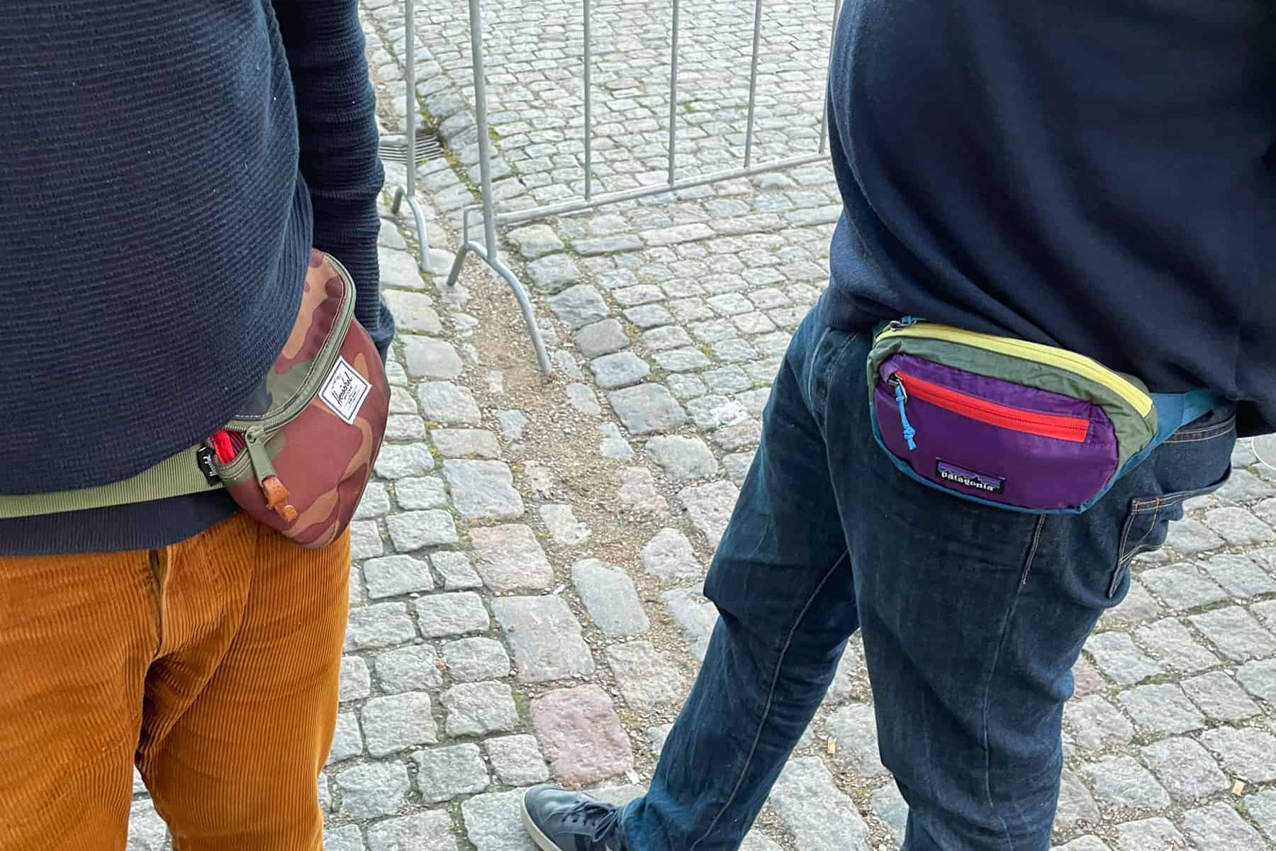Different Fanny Packs Worn On Two Individuals