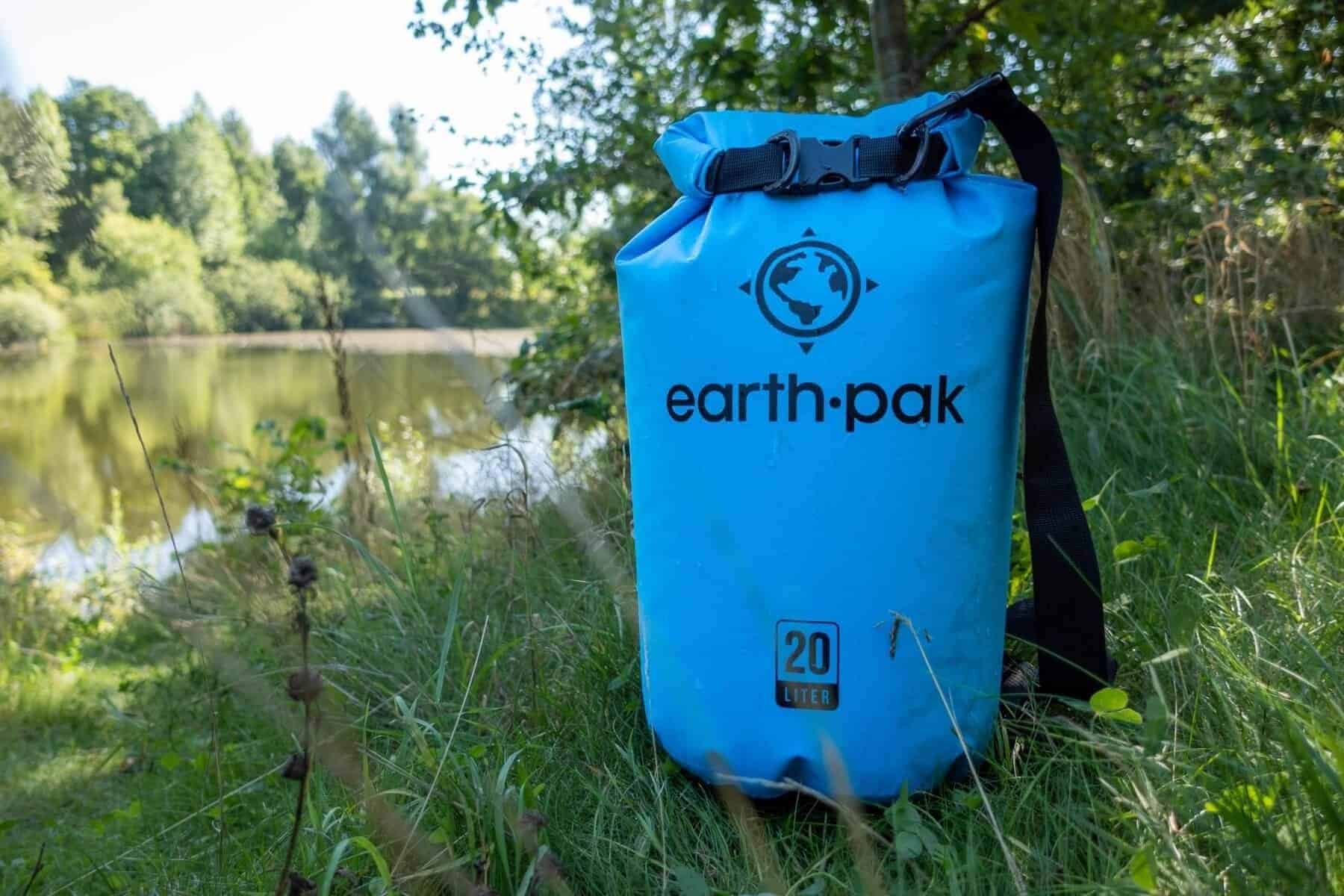 earth-pak-waterproof-standing-on-grass