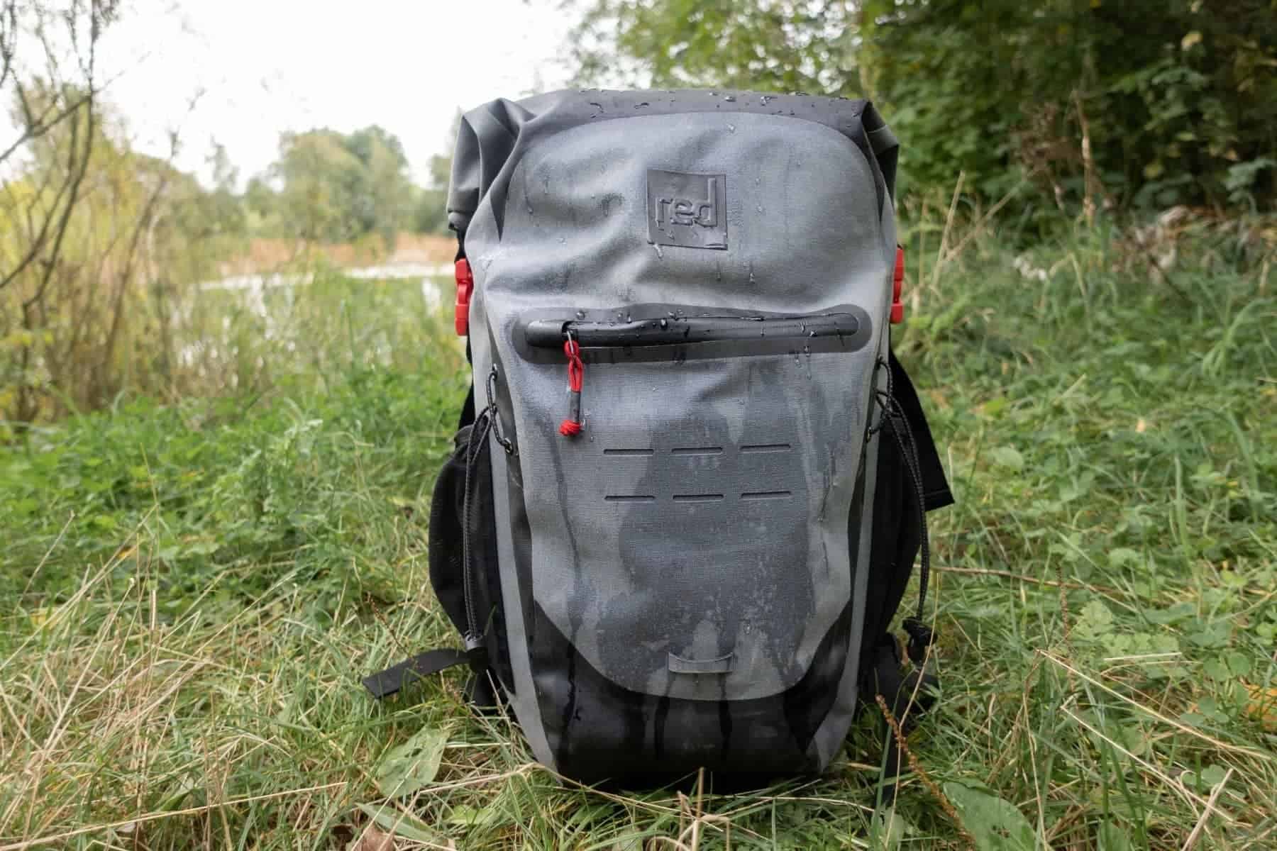 red-eco-friendly-waterproof-30l-wet-on-grass